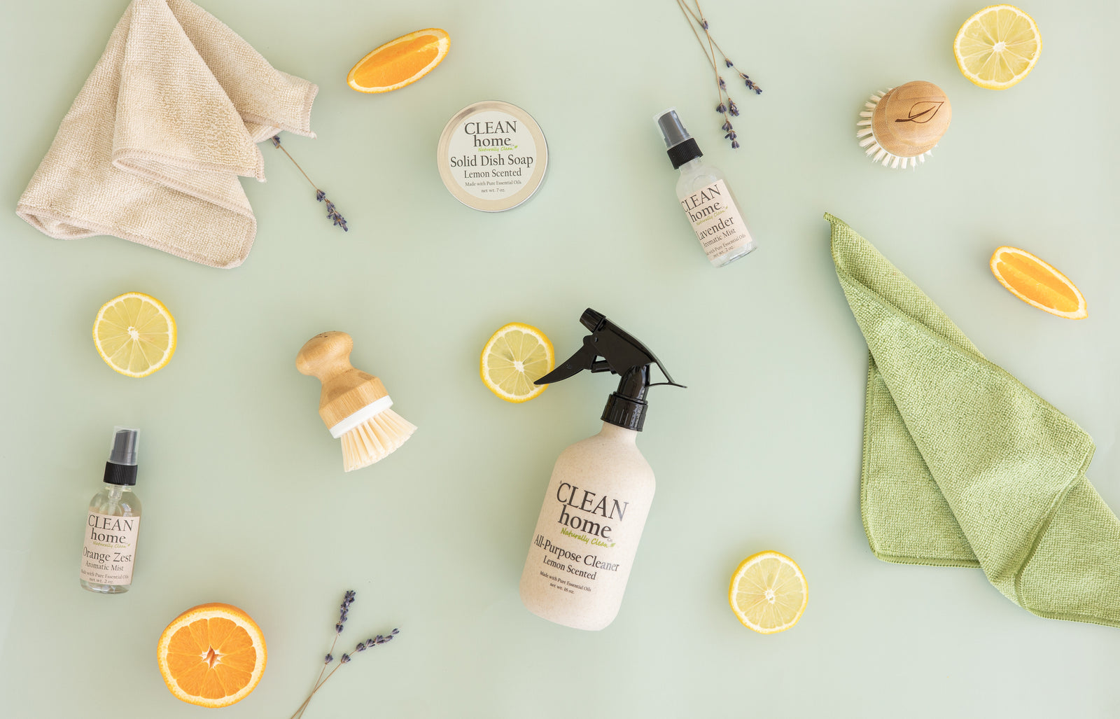 A flat lay of A Clean Home Company natural home and body care products